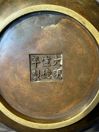 A Chinese bronze censer with lion handles, Xuande mark, 17/18th C.