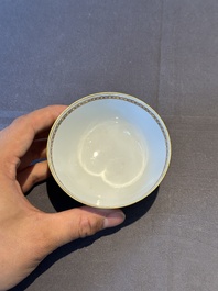 A pair of Chinese armorial famille rose cups and saucers with the arms of Tyndall for the English market and two monogrammed bowls, Qianlong