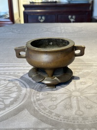 A Chinese bronze censer and stand, Xuande mark, 17th C.