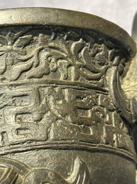 A Chinese bronze 'elephant' tripod censer and cover, Ming