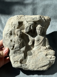 A Gandhara grey schist fragment of a seated Buddha with his disciple and a fragment with five figures, 1st/3rd C.