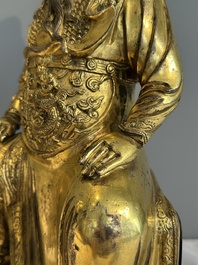 An extremely rare Chinese gilt bronze figure of Guandi, Ming