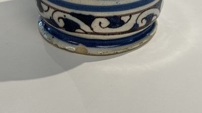 A blue, white and manganese Portuguese faience albarello, 17th C.