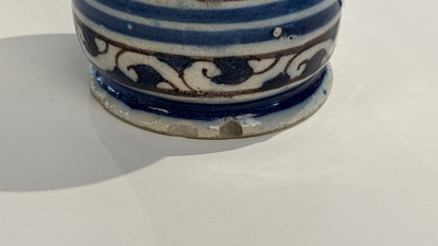 A blue, white and manganese Portuguese faience albarello, 17th C.