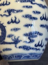 A Chinese blue and white 'dragon' vase, a famille rose 'millefleurs' vase and a teapot, Qianlong mark, 19/20th C.