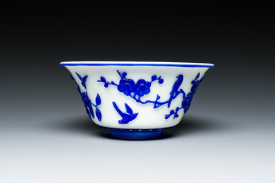 A Chinese blue-overlay white Beijing glass vase, a multi-colour brush pot and three bowls, 19th C.