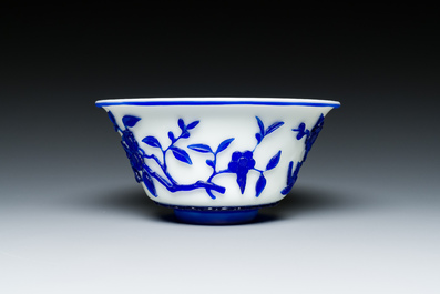 A Chinese blue-overlay white Beijing glass vase, a multi-colour brush pot and three bowls, 19th C.