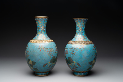 A pair of Chinese cloisonn&eacute; 'flowers and insects' vases on wooden stands, 18/19th C.