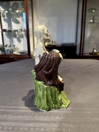 A fine Chinese sancai-glazed figure of a Luohan, Qianlong