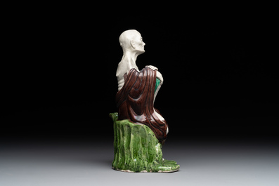 A fine Chinese sancai-glazed figure of a Luohan, Qianlong