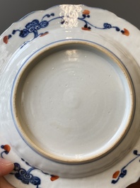 A Chinese verte biscuit teapot, a English-decorated blue and white plate and a ewer, Kangxi