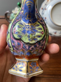 A Chinese verte biscuit teapot, a English-decorated blue and white plate and a ewer, Kangxi