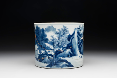 A Chinese blue and white 'landscape' brush pot, Kangxi