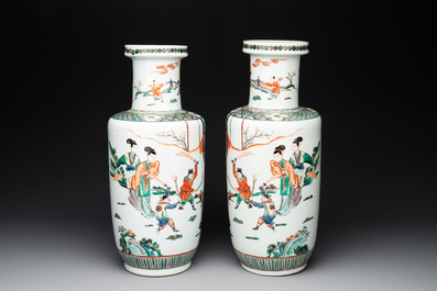 A pair of Chinese famille verte rouleau vases with narrative design, 19th C.