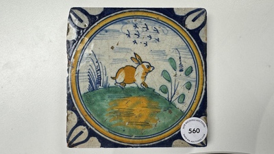 A polychrome Dutch Delft maiolica 'medallion' 'hare' tile, late 16th C.