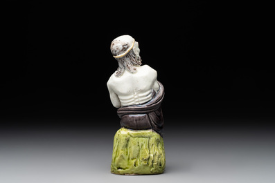 A Chinese sancai-glazed figure of a Luohan, Qianlong