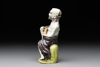 A Chinese sancai-glazed figure of a Luohan, Qianlong