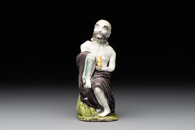 A Chinese sancai-glazed figure of a Luohan, Qianlong