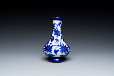 A Chinese blue-overlay white Beijing glass vase, a multi-colour brush pot and three bowls, 19th C.