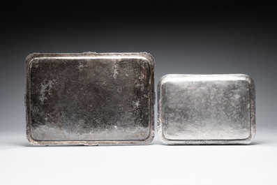 Two silver trays with engraved figural design, Iran, 20th C.