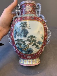 A fine Chinese famille rose ruby-sgraffito-ground 'Hai Wu Tian Shou 海屋添壽' vase with 'chilong' handles, Qianlong mark and of the period