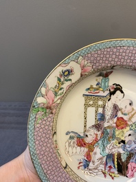 An extremely fine pair of Chinese famille rose 'ruby back' eggshell plates with a lady and playing boys, Yongzheng