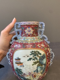 A fine Chinese famille rose ruby-sgraffito-ground 'Hai Wu Tian Shou 海屋添壽' vase with 'chilong' handles, Qianlong mark and of the period