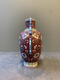 A fine Chinese famille rose ruby-sgraffito-ground 'Hai Wu Tian Shou 海屋添壽' vase with 'chilong' handles, Qianlong mark and of the period