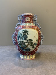 A fine Chinese famille rose ruby-sgraffito-ground 'Hai Wu Tian Shou 海屋添壽' vase with 'chilong' handles, Qianlong mark and of the period