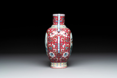 A fine Chinese famille rose ruby-sgraffito-ground 'Hai Wu Tian Shou 海屋添壽' vase with 'chilong' handles, Qianlong mark and of the period