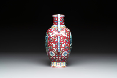 A fine Chinese famille rose ruby-sgraffito-ground 'Hai Wu Tian Shou 海屋添壽' vase with 'chilong' handles, Qianlong mark and of the period