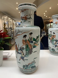 A pair of Chinese famille verte rouleau vases with narrative design, 19th C.