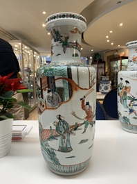 A pair of Chinese famille verte rouleau vases with narrative design, 19th C.