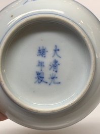 A Chinese gilt-decorated blue and white 'lotus scroll' square bowl, a saucer and a doucai 'dragon' cup, Daoguang mark and of the period