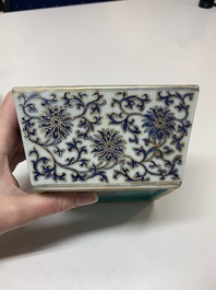 A Chinese gilt-decorated blue and white 'lotus scroll' square bowl, a saucer and a doucai 'dragon' cup, Daoguang mark and of the period