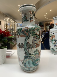 A pair of Chinese famille verte rouleau vases with narrative design, 19th C.