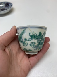 A Chinese gilt-decorated blue and white 'lotus scroll' square bowl, a saucer and a doucai 'dragon' cup, Daoguang mark and of the period