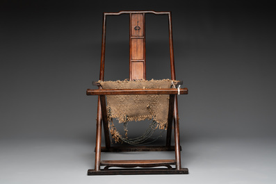 A Chinese huanghuali wooden folding chair, 17/18th C.