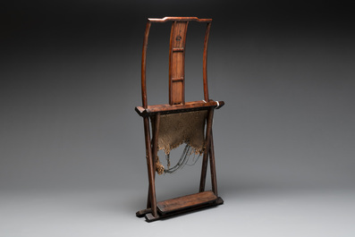 A Chinese huanghuali wooden folding chair, 17/18th C.