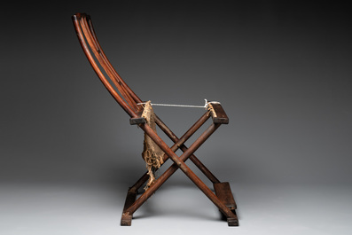 A Chinese huanghuali wooden folding chair, 17/18th C.