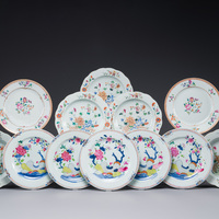 A pair of Chinese famille rose plates with mandarin design and a ...