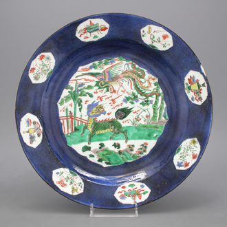 A large powder blue ground famille verte dish, Kangxi, ca. 1690