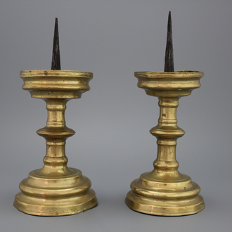 A pair of brass pricket candlesticks, 16th C.