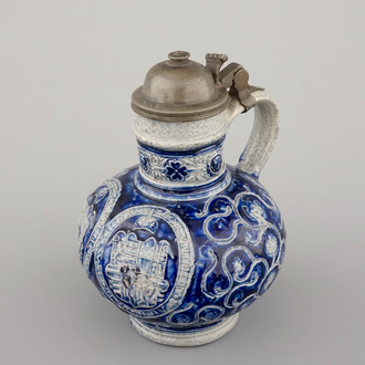 A fine Westerwald stoneware pewter-mounted jug with the coat of arms of France, dated 1597