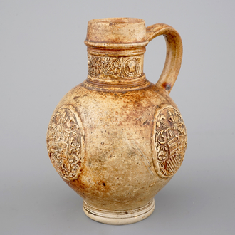 A Raeren armorial stoneware jug, ca.1600