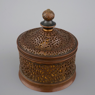 A cylindrical brass and bronze box and cover, 16/17th C., probably Venice