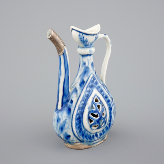 A reticulated blue and white silver-mounted Safavid jug, 17/18th C.