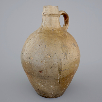A tall stoneware bellarmine face jug, 17/18th C.