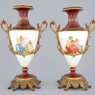 A pair of Sèvres style vases with bronze mounts, Brussels, 19th C.