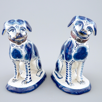 A pair of dated blue and white dogs, Harlingen, Friesland, 1752
